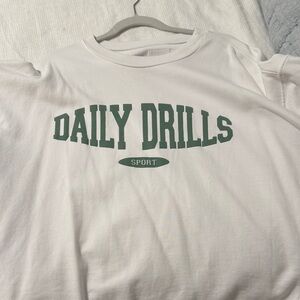 Daily Drills White Sweatshirt. Worn 2x. 1 smudge on arm.